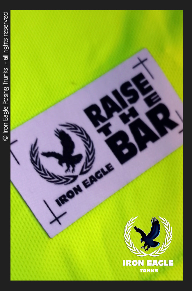 Flo yellow textured Iron Eagle training tank with a purple Raise the Bar label and eagle logo; no posing trunks visible. - Iron Eagle Training Tank - Flo Yellow - S
