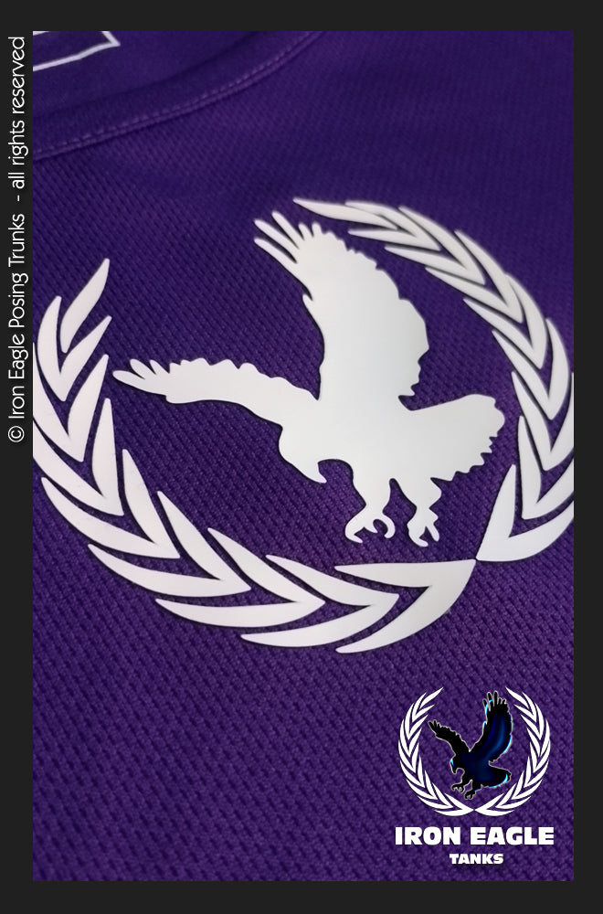 Purple textured Iron Eagle training tank fabric with a white eagle and laurel emblem; posing trunks brand graphic. - Iron Eagle Training Tank - Purple - S