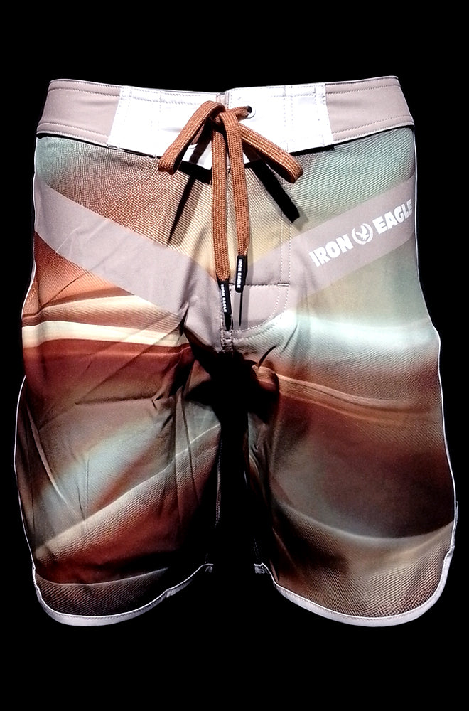 Sahara posing trunks with a white waistband, drawstring, and abstract brown, cream, and gray print. - - Sahara - 15'' LR - 28'' (*actual waistband length 29'')