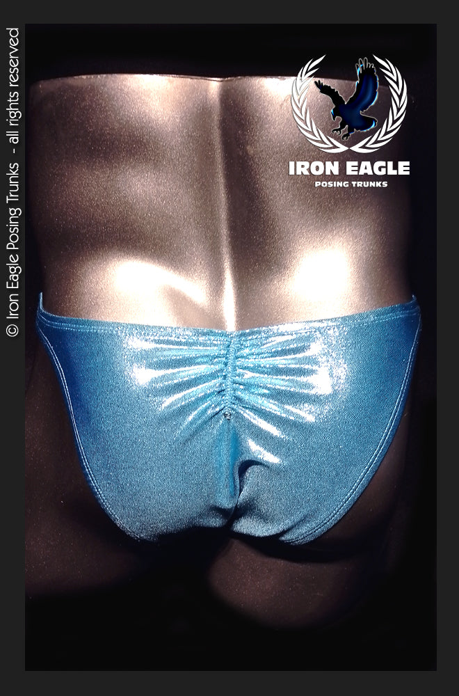 Shimmering sky-blue posing trunks with a ruched front and narrow waistband, modeled on stage. - Sky Blue Mystique - Premier / S / With